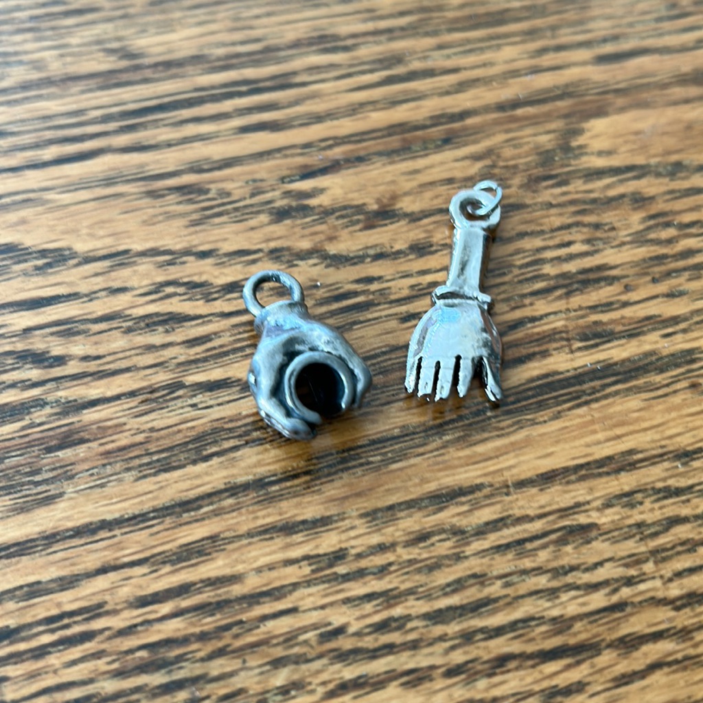 Two Unique Hand Pendants